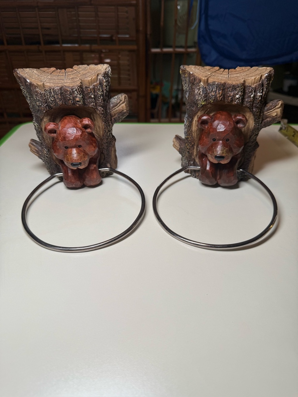 2 primitive rustic bear-themed towel holders made of resin,carved wood look.